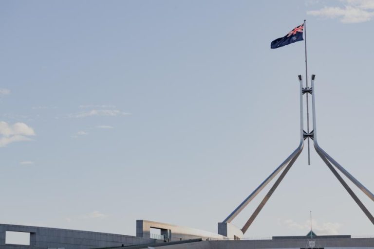 Australia Flag Above Federal Parliament House